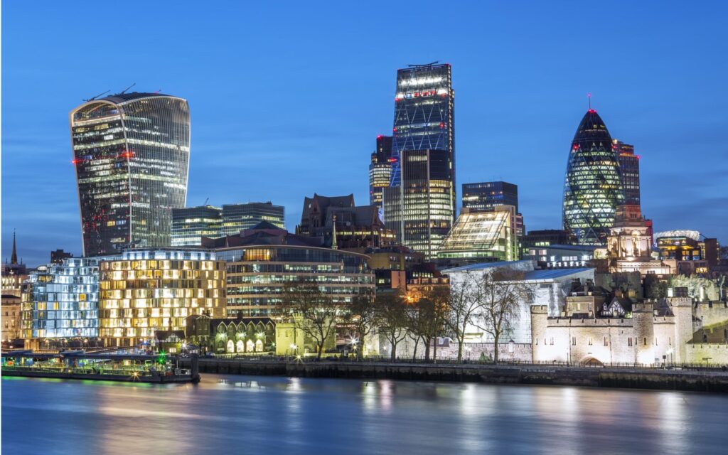 Evening photo of modern, high office buildings in Canary Wharf.