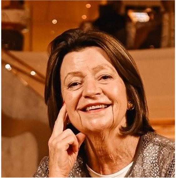 Head and shoulders of lady smiling at camera