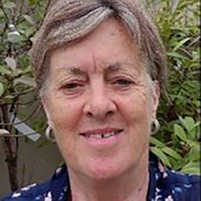 Head and shoulders of lady smiling at camera