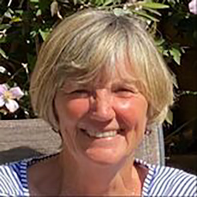 Head and shoulders of lady smiling at camera