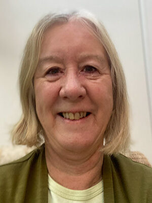 Head and shoulders of lady smiling at camera